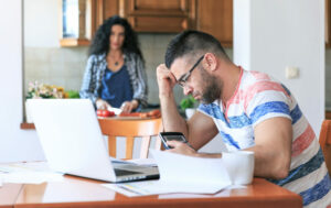 Man working at home, having problems